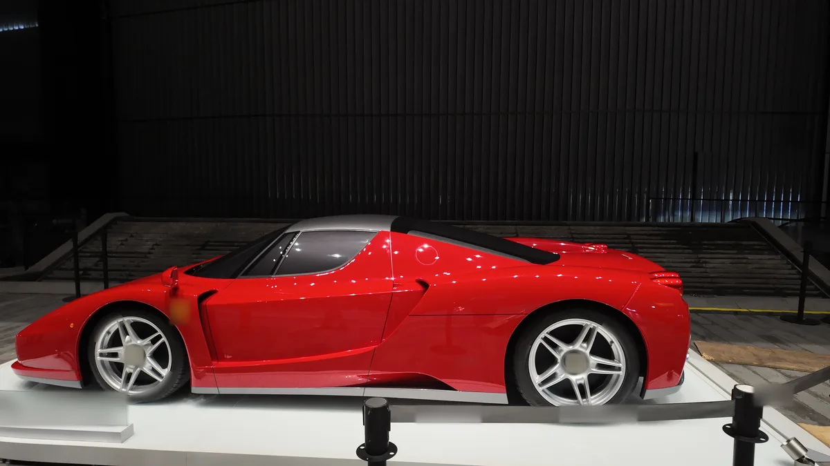 Earlier display retrospective: the automotive exhibit on its completed display platform, photographed on 30 June 2026.